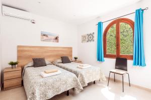 Katil atau katil-katil dalam bilik di Villa Casa Feliz by Villa Plus