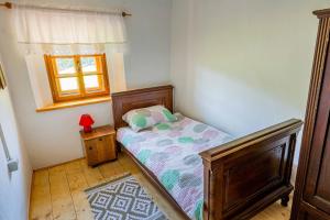 Postel nebo postele na pokoji v ubytování Domačija Gačnik