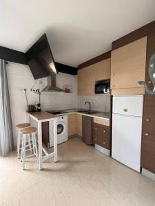 Kuchyňa alebo kuchynka v ubytovaní Apartamento Vacacional & Holiday
