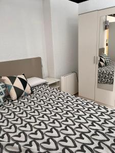 Posteľ alebo postele v izbe v ubytovaní Apartamento Vacacional & Holiday