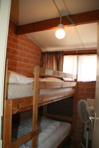 Ένα ή περισσότερα κρεβάτια σε δωμάτιο στο Rekerlanden 173 +9 φωτογραφίες