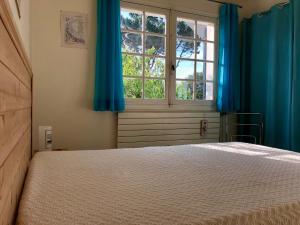 Posteľ alebo postele v izbe v ubytovaní Villa avec Jardin à 250 m de l'océan WIFI