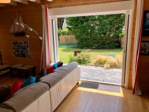 Posedenie v ubytovaní Villa avec Jardin à 250 m de l'océan WIFI
