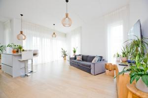 Istumisnurk majutusasutuses New! Spacious apartment in marina with a balcony