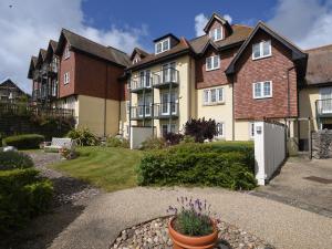 a large house with a garden in front of it at 1 Buckfields in Lyme Regis