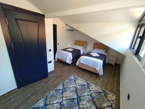 A bed or beds in a room at Villa KayaHan Göcek