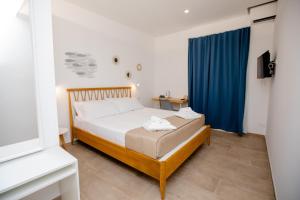 Posteľ alebo postele v izbe v ubytovaní Kaary BellaVita Superior Room