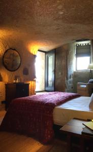 Postel nebo postele na pokoji v ubytování SOTA Cappadocia