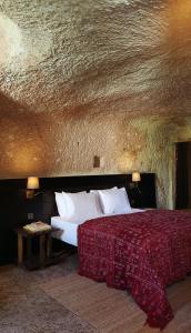 Postel nebo postele na pokoji v ubytování SOTA Cappadocia