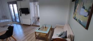 Telewizja i/lub zestaw kina domowego w obiekcie Happy Haris Place