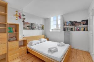 Posteľ alebo postele v izbe v ubytovaní Le Grand Boudoir