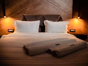 Postelja oz. postelje v sobi nastanitve Hotel Goya Boutique