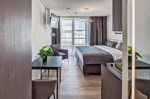 Postel nebo postele na pokoji v ubytování MOOI Apartments Schlieren