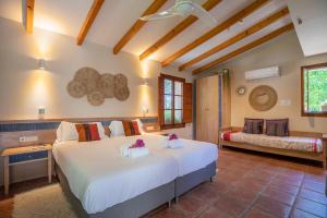 A bed or beds in a room at Selva - 38903 Mallorca Még 37 kép