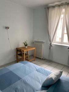 Posteľ alebo postele v izbe v ubytovaní APPARTEMENT SPACIEUX