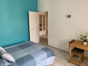 Posteľ alebo postele v izbe v ubytovaní APPARTEMENT SPACIEUX