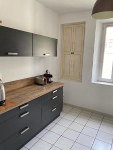 Kuchyňa alebo kuchynka v ubytovaní APPARTEMENT SPACIEUX