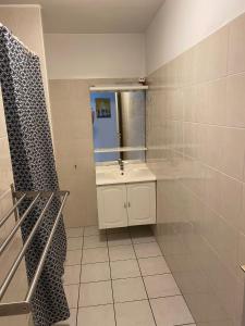 Kúpeľňa v ubytovaní APPARTEMENT SPACIEUX