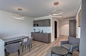 Kuchyň nebo kuchyňský kout v ubytování MOOI Apartments Schlieren + 27 fotografií