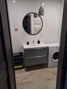 Bilik mandi di Apartament BALTIC +23 gambar
