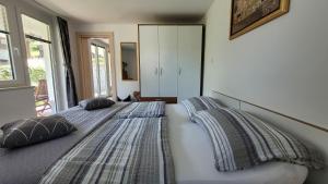 Postel nebo postele na pokoji v ubytování Apartma Julija