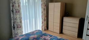 Katil atau katil-katil dalam bilik di Apartamenty Modrzewiowe Tarasy