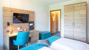 Voodi või voodid majutusasutuse Das Wiesgauer - Alpenhotel Inzell toas