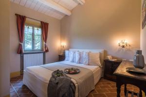Posteľ alebo postele v izbe v ubytovaní Villa La Capuccina + 27 fotografií