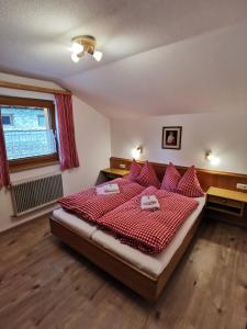 En eller flere senge i et værelse på Ferienwohnungen Böhm