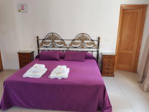 Postel nebo postele na pokoji v ubytování Hotel Marítimo Urban