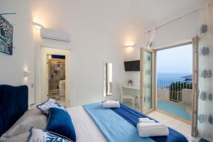 Кровать или кровати в номере Residence Buonocore