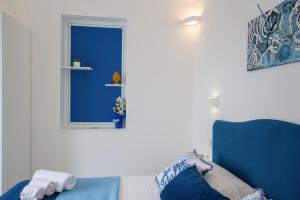 Кровать или кровати в номере Residence Buonocore