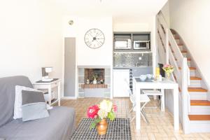 Fotografie z fotogalerie ubytování Le Regina Rifle - Appartement avec jardinet v destinaci Courseulles-sur-Mer