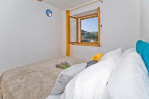 Posteľ alebo postele v izbe v ubytovaní Sparrow Nest Hvar