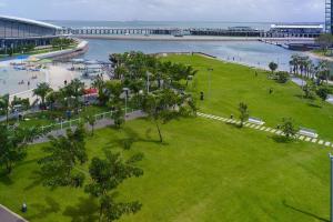 an aerial view of a park next to a body of water at Top End Marvel -Darwin's Premier 3-BR Luxury Apt in Darwin