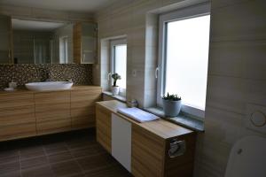 Koupelna v ubytování Guesthouse Avsenik + 33 fotografií