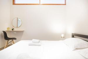Ένα ή περισσότερα κρεβάτια σε δωμάτιο στο La Pietra Verga