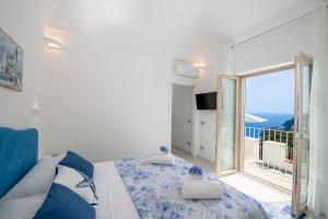 Кровать или кровати в номере Residence Buonocore