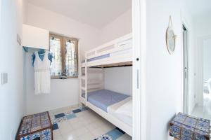 Кровать или кровати в номере Residence Buonocore