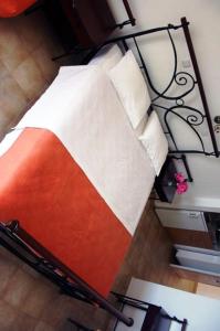 Postel nebo postele na pokoji v ubytování Hotel Rigakis