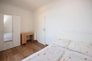 Posteľ alebo postele v izbe v ubytovaní Villa Anna