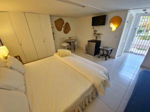 Uma cama ou camas num quarto em Adonai Hotel Boutique