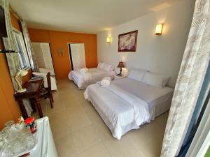 Uma cama ou camas num quarto em Adonai Hotel Boutique