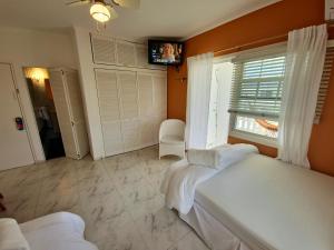 Uma cama ou camas num quarto em Adonai Hotel Boutique