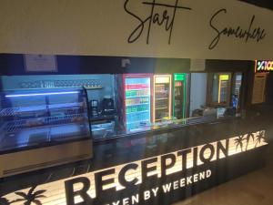 a restaurant with a sign in the window of a store at EXEN BY WEEKEND in Bodrum City +46 photos