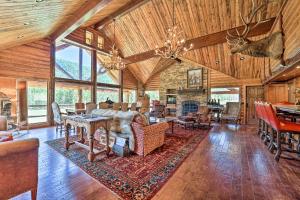 a living room filled with furniture and a fireplace at Fish Creek Ranch in Dolores Hot Tub and Game Room in Dolores