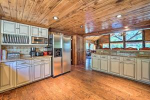 a kitchen with stainless steel appliances and a wooden ceiling at Fish Creek Ranch in Dolores Hot Tub and Game Room in Dolores