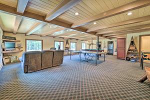 a living room with a ping pong table at Fish Creek Ranch in Dolores Hot Tub and Game Room in Dolores