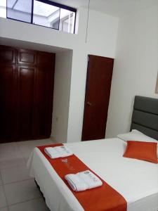 Cama o camas de una habitación en Hostal Resident