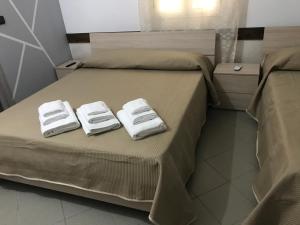Postel nebo postele na pokoji v ubytování B&B The King